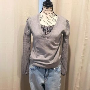 Gray sweater with gingham under shirt